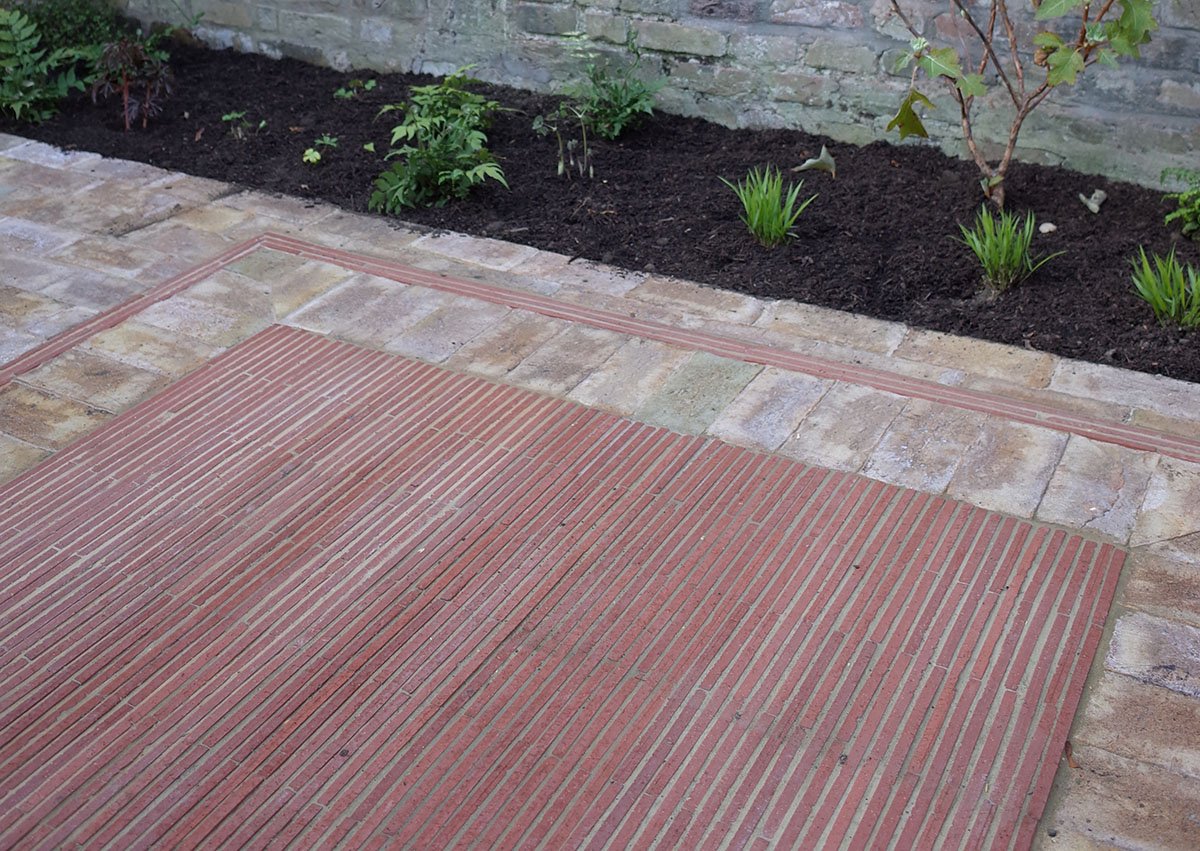 Garden project in Brixton by Ula Maria Garden design using Ketley creasing tiles on edge (1).jpg