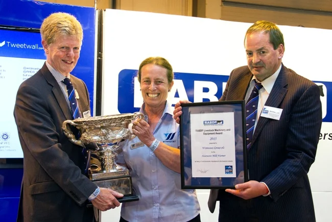 Gill Dickson receives the RABDF Livestock Machinery and Equipment Award from left, RABDF president, Prof David Leaver and Council member, Angus Wielkopolski