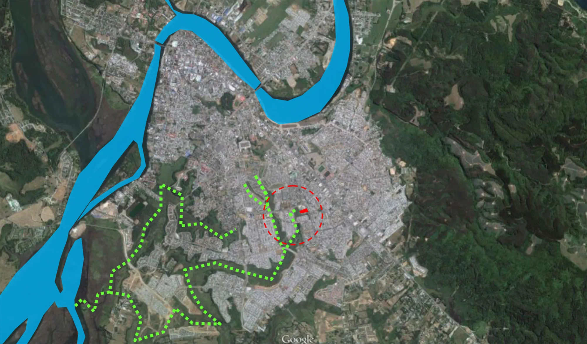 Fig. 02: Vista de la ciudad de Valdivia desde el aire | Terreno y afluentes verdes. 