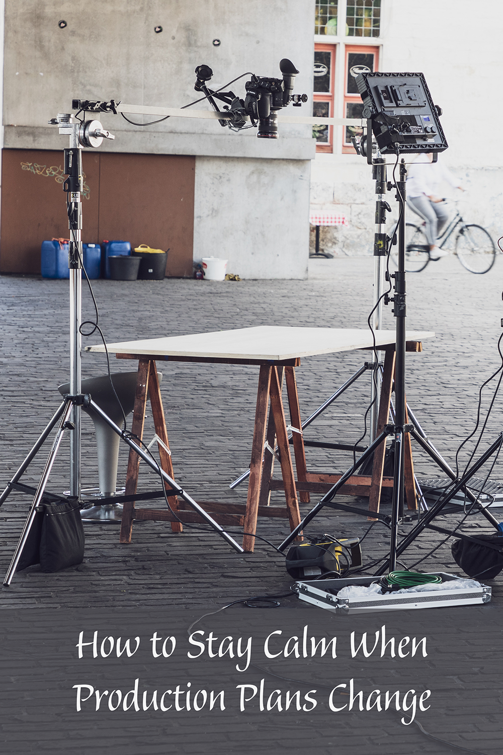 Promotional graphic for a blog post titled ' how to stay calm when production plans change' featuring an image of cameras and lighting equipment on a film set