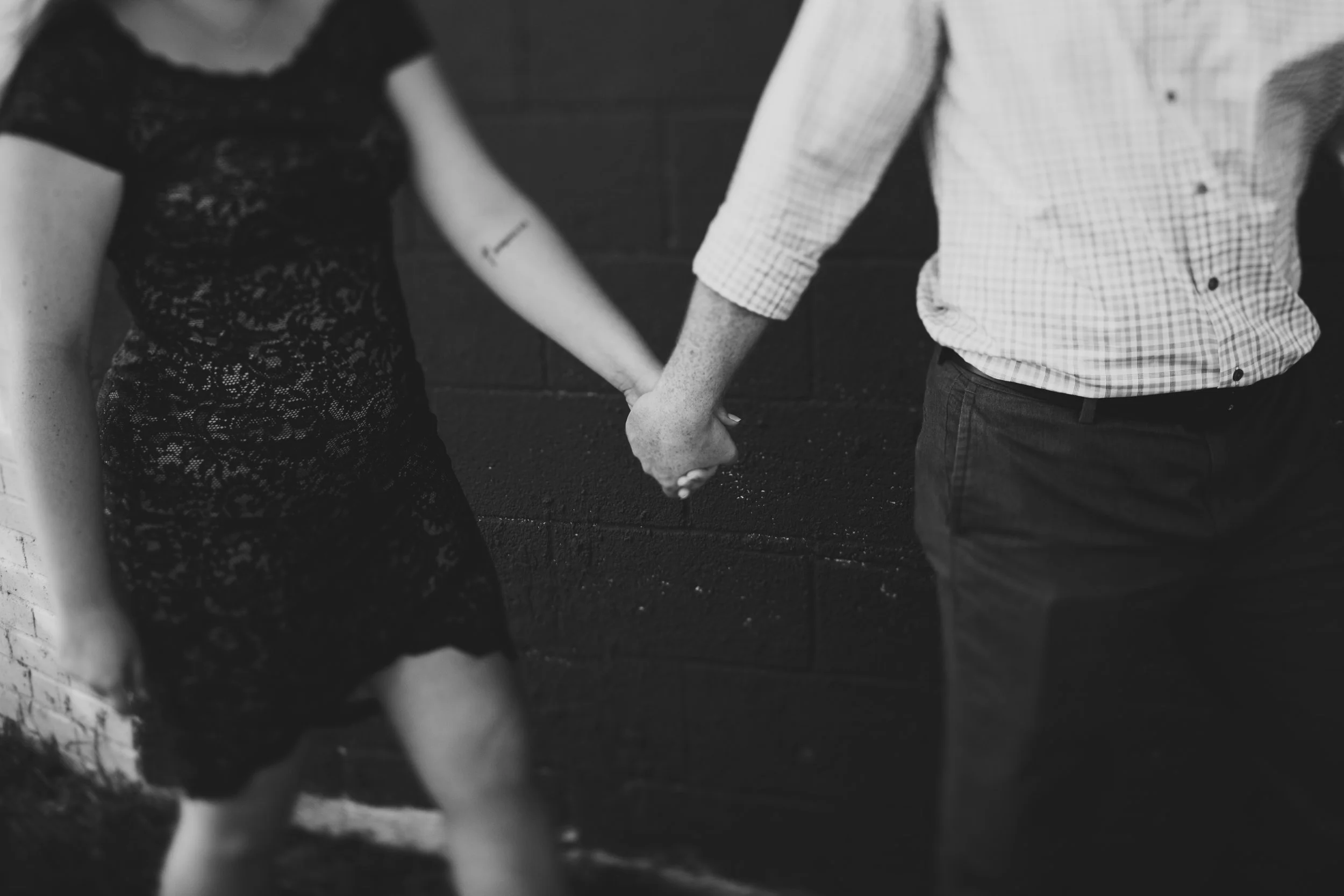 couple walking hold hands for engagement