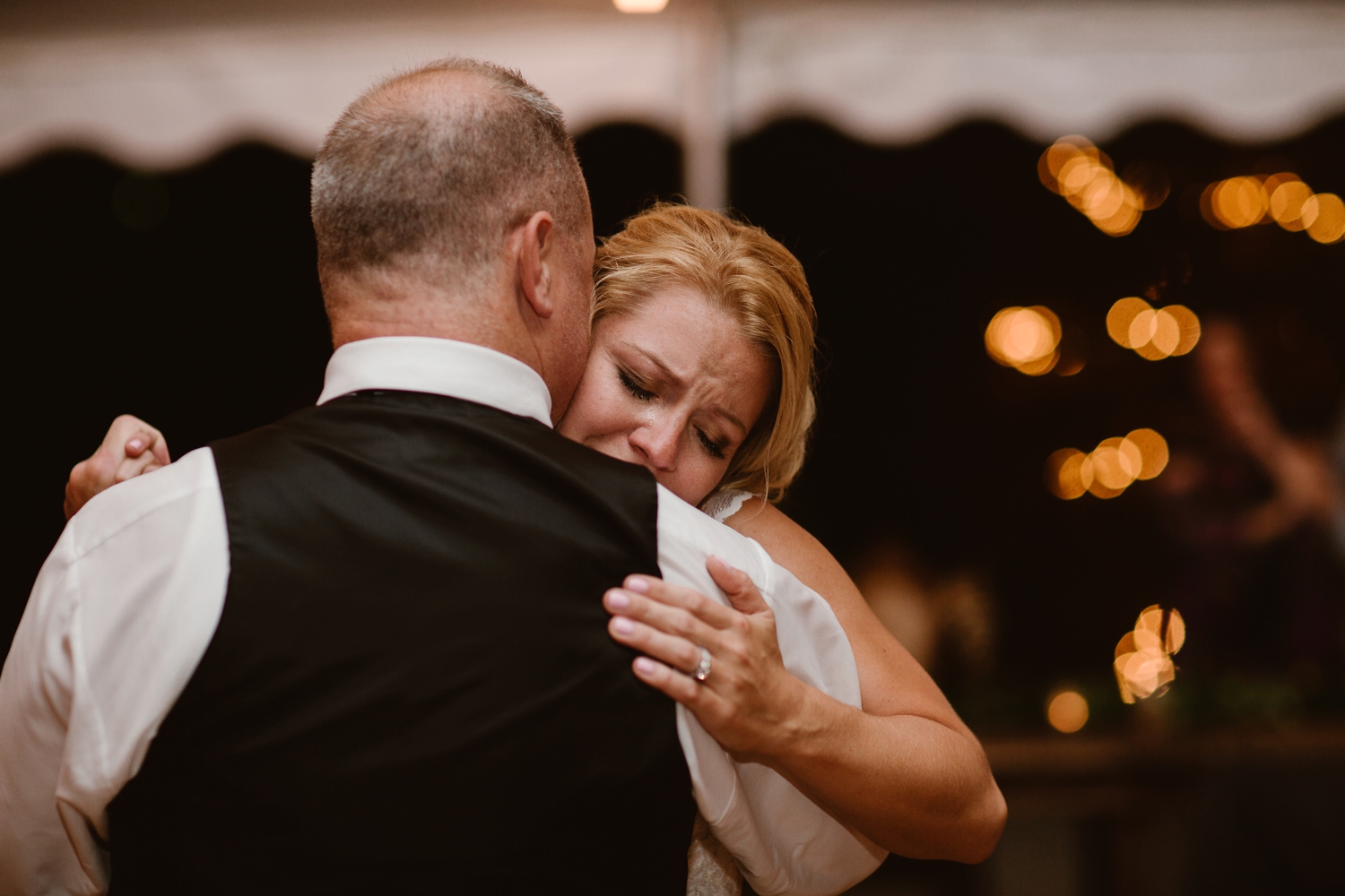 intimate moment during first dance with dad