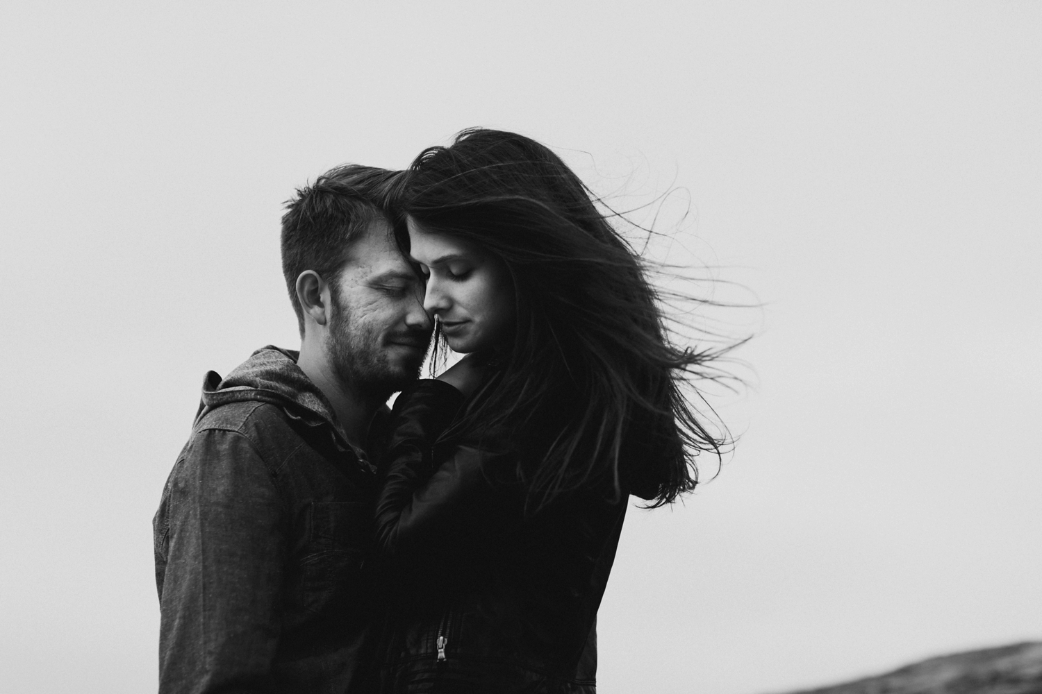 windy costal engagement session