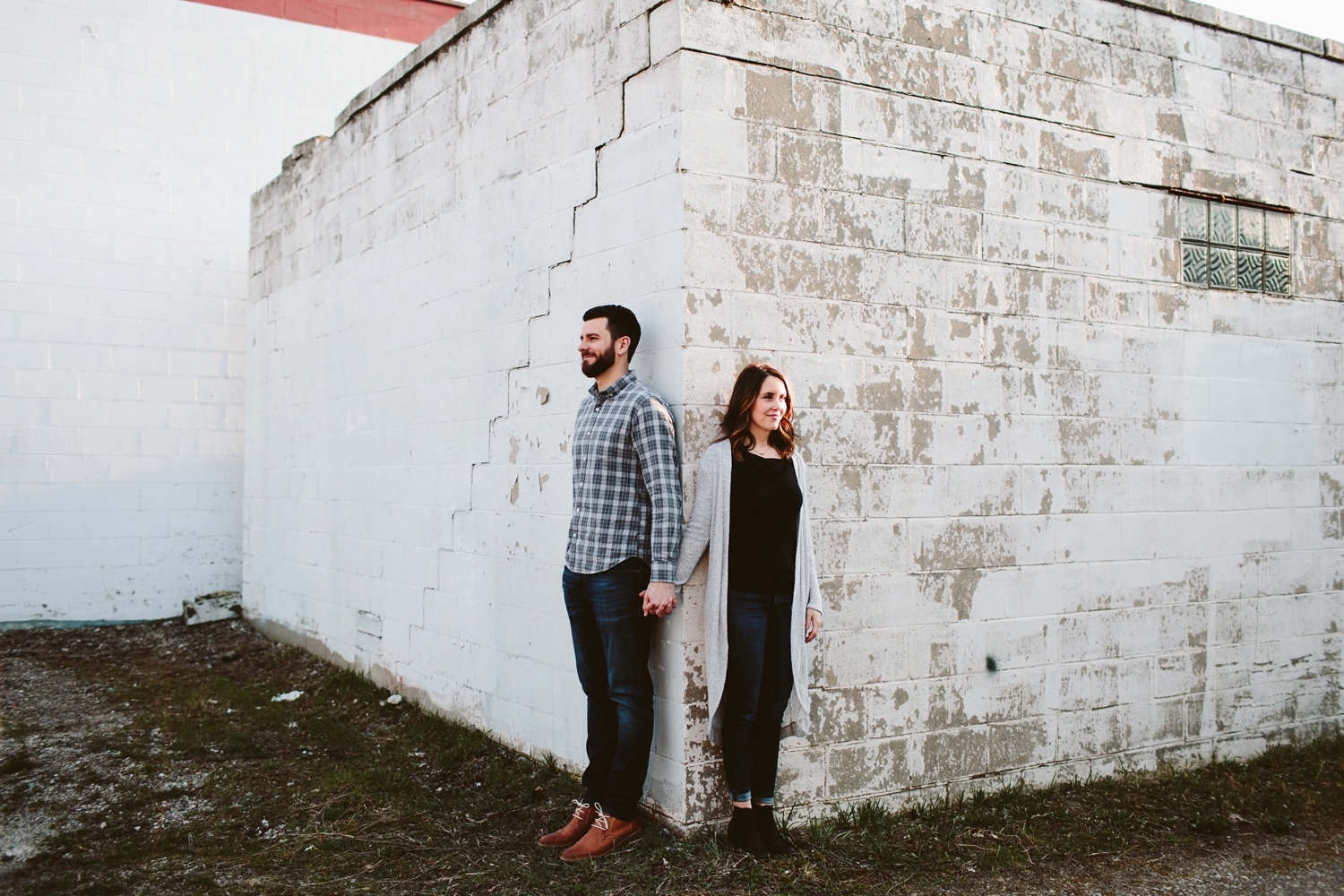 engagement session on textured walls of downtown minneapolis