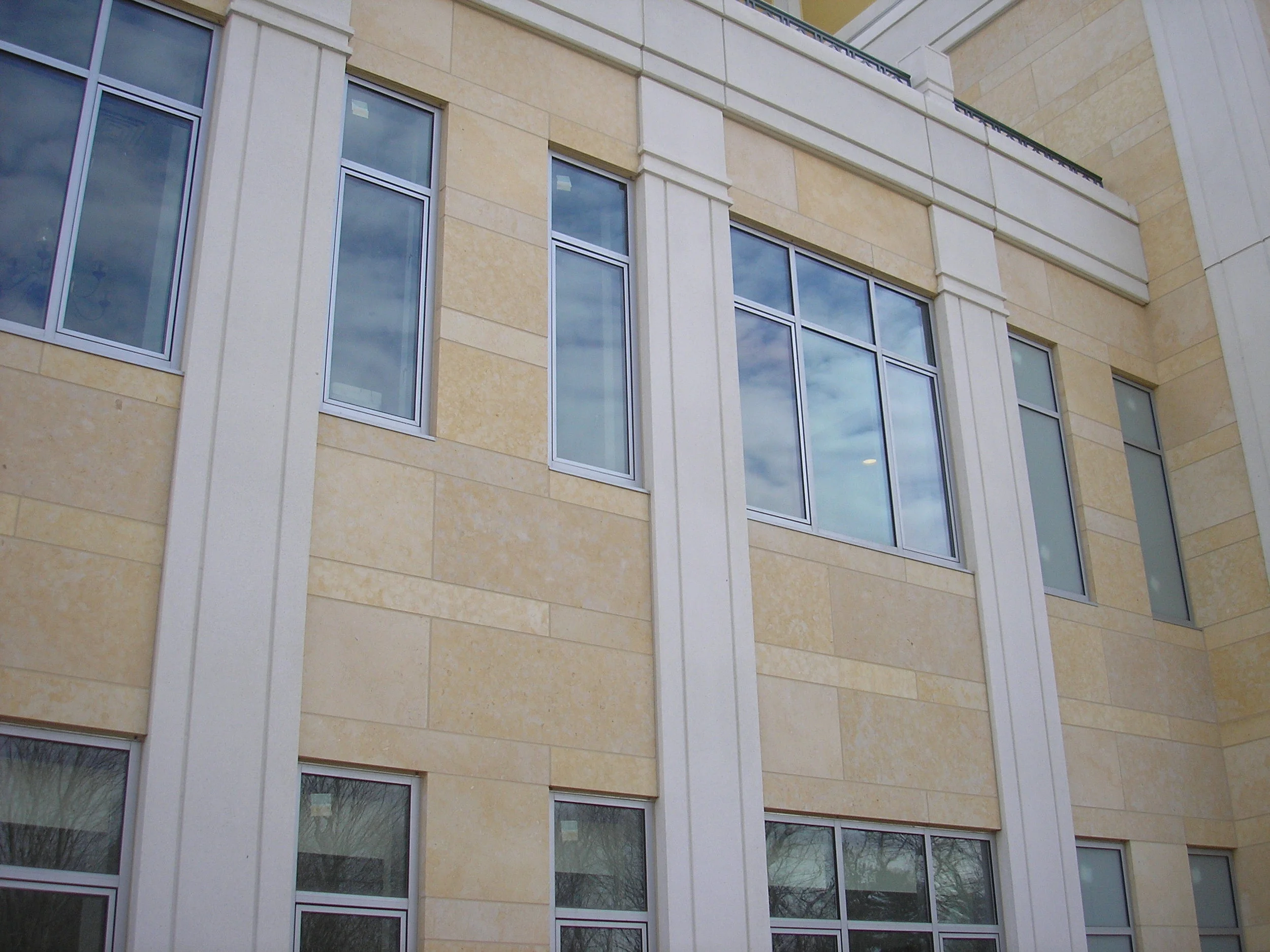 Completed Facade - limestone & precast pilasters