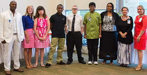 (left to right): Eric Tolbert, VR Job Coach; Katherine Harris, Business Liaison, Palmetto Health Parkridge; Project SEARCH graduates Taylor Keeshan, Rodheem Perry, Daniel Austin, Tarung Parikh, and Judith Gillings; Sandi Batten, Arc of the Midlands Job Coach; Elizabeth Magee, Instructor.