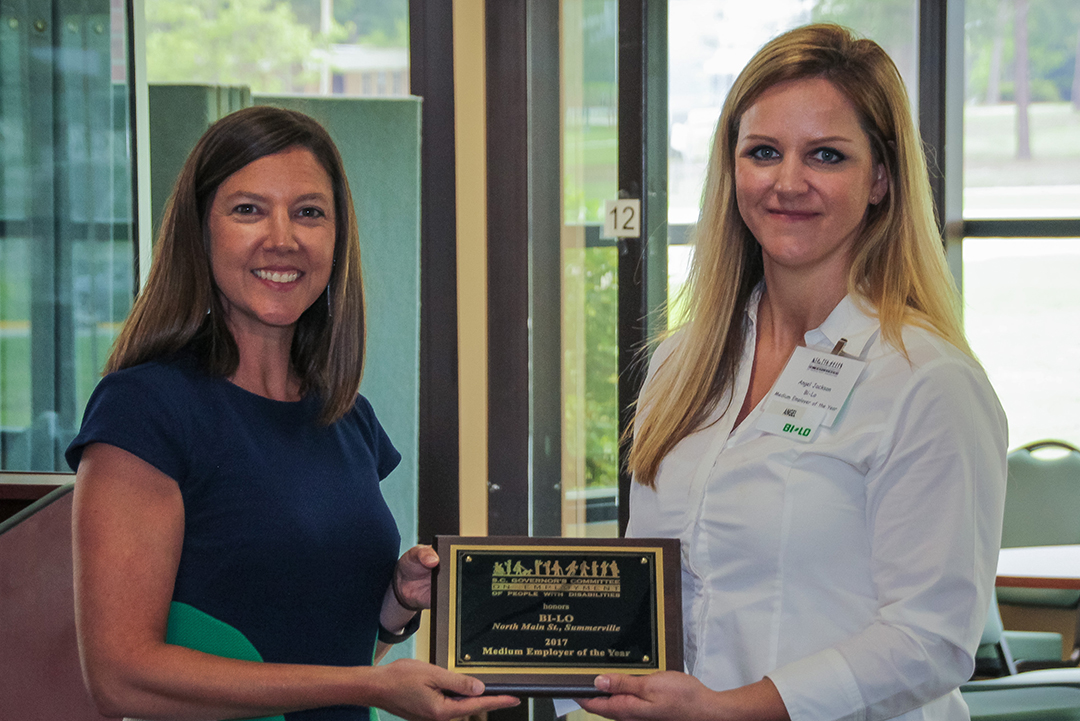 Angel Jackson (right), store manager at BI-LO on North Main Street in Summerville, accepts the Medium Employer of the Year Award from Kelly Sieling of the Summerville Mayor’s Committee and the SC Vocational Rehabilitation Department’s Berkeley-Dorchester area office.