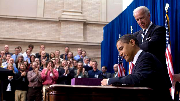 President Obama signs the American Recovery and Reinvestment Act as Vice President Biden watches in Denver, Colo. on Feb. 17, 2009.
(White House photo by Pete Souza)