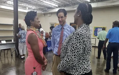 VR Interim Commissioner Felicia Johnson and Area Development Director Gail Murray speak with an attendee at the Second Annual Pee Dee Reentry Job Fair & Expo.