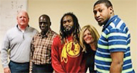 (left to right) Tommy Pruitt, Human Resources Manager, Ruiz Foods; VR consumers Michael Brooks and Alonzo Rowell; VR Business Development Specialist Sherry Grant; and Harry Scott, VR consumer.