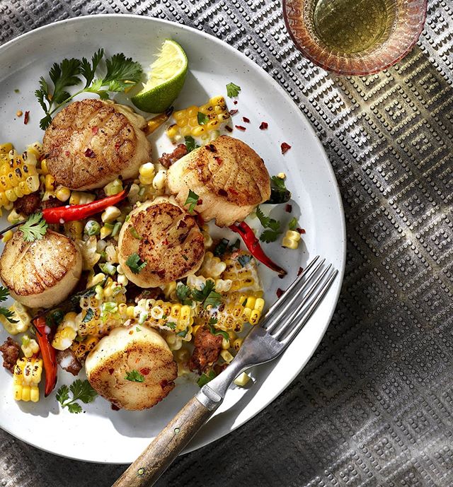 Scallops with corn chorizo salad. @cindymelin I don't even eat seafood &amp; this looks good to me! Love our sample days! &amp; love this new surface! It's not very big but it's a beauty! #props #propstylist #propstyling #prophouse #propcloset #propc