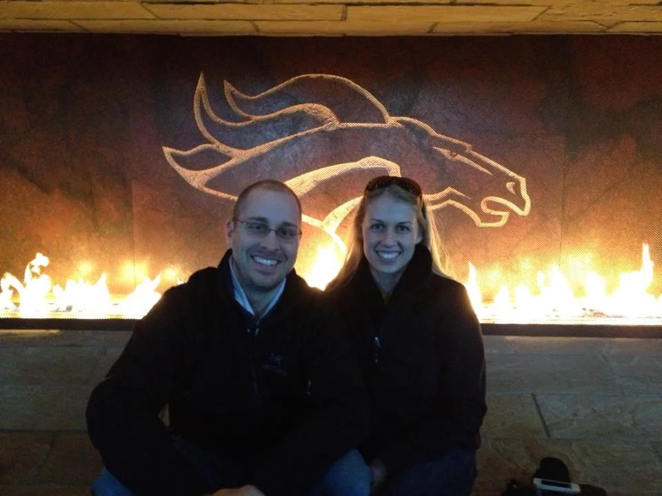 Patti and Ryan at a Broncos game.