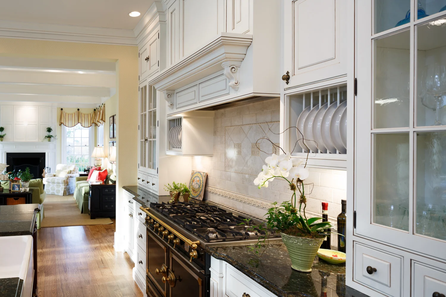 15_kitchen-range-white-cabinetry-black-granite.jpg