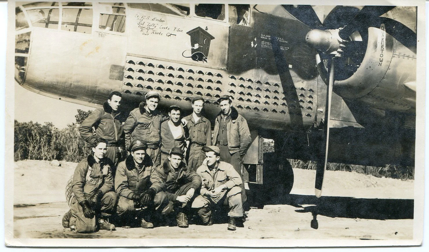 The flight and ground crew of Outhouse Mouse, a B-25 that flew more than 100 missions in the Mediterranean Theatre.