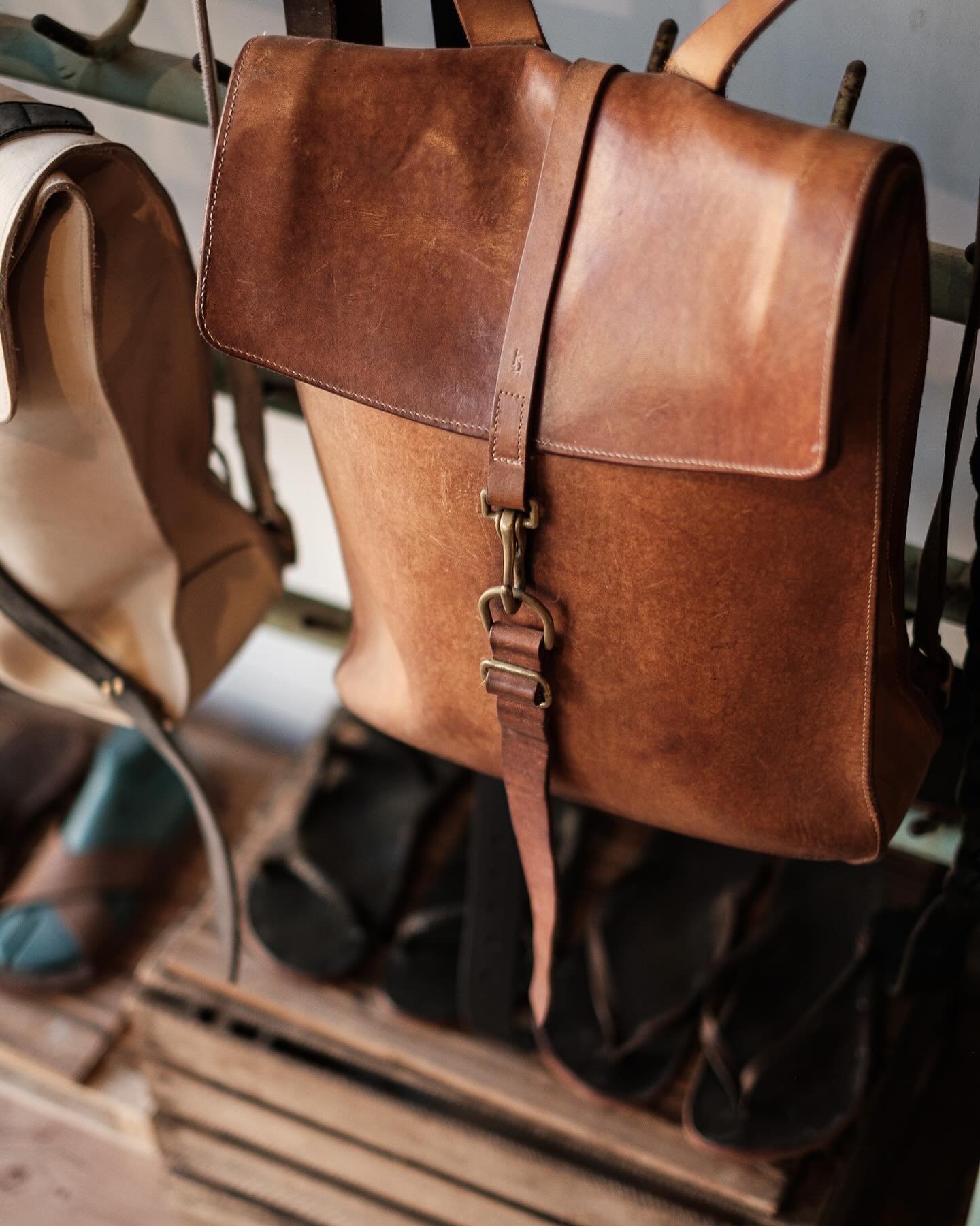 One of the first bags I made about 15 years ago. I made it for Sabine. New York snow and rain storms  and the blasting Sahara heat waves in a Spain turned this natural postal #1 into a canvas of deep tones - reminding us of our adventures. Pictures @