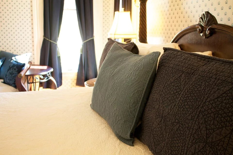 Plush linens invite you to relax in the king bed of Room 5 at the Willard Inn, Burlington, vt.