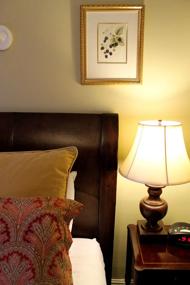 Leather headboard of queen bed in Rm 6 at Burlington, VT Bed and Breakfast, offering victorian charm at the WIllard Street Inn