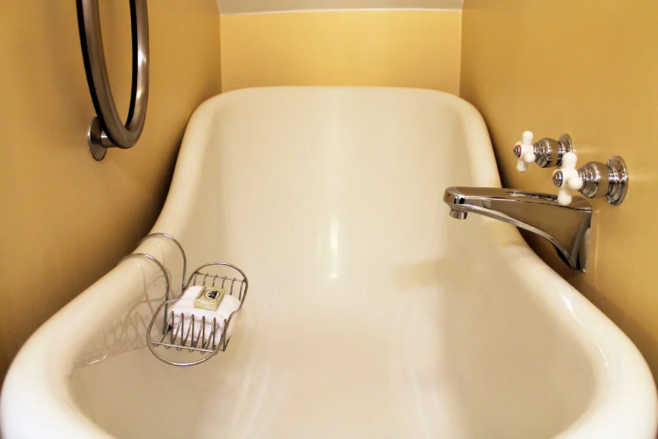 Large slipper soaking tub adds to the luxury accommodations of the Suite Larkin.
