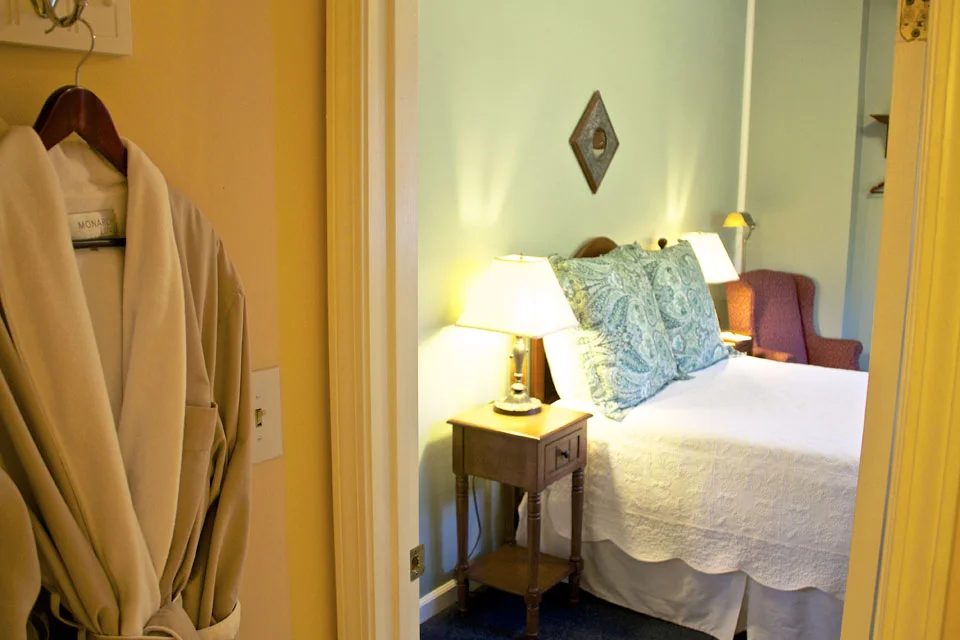 Soft Bathrobes hang inside the bath of Lindsey's loft, adding to the Cozy accommodations offered at Burlington, Vermont's willard Street Inn.
