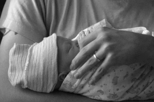 dadwithnewborn.jpg