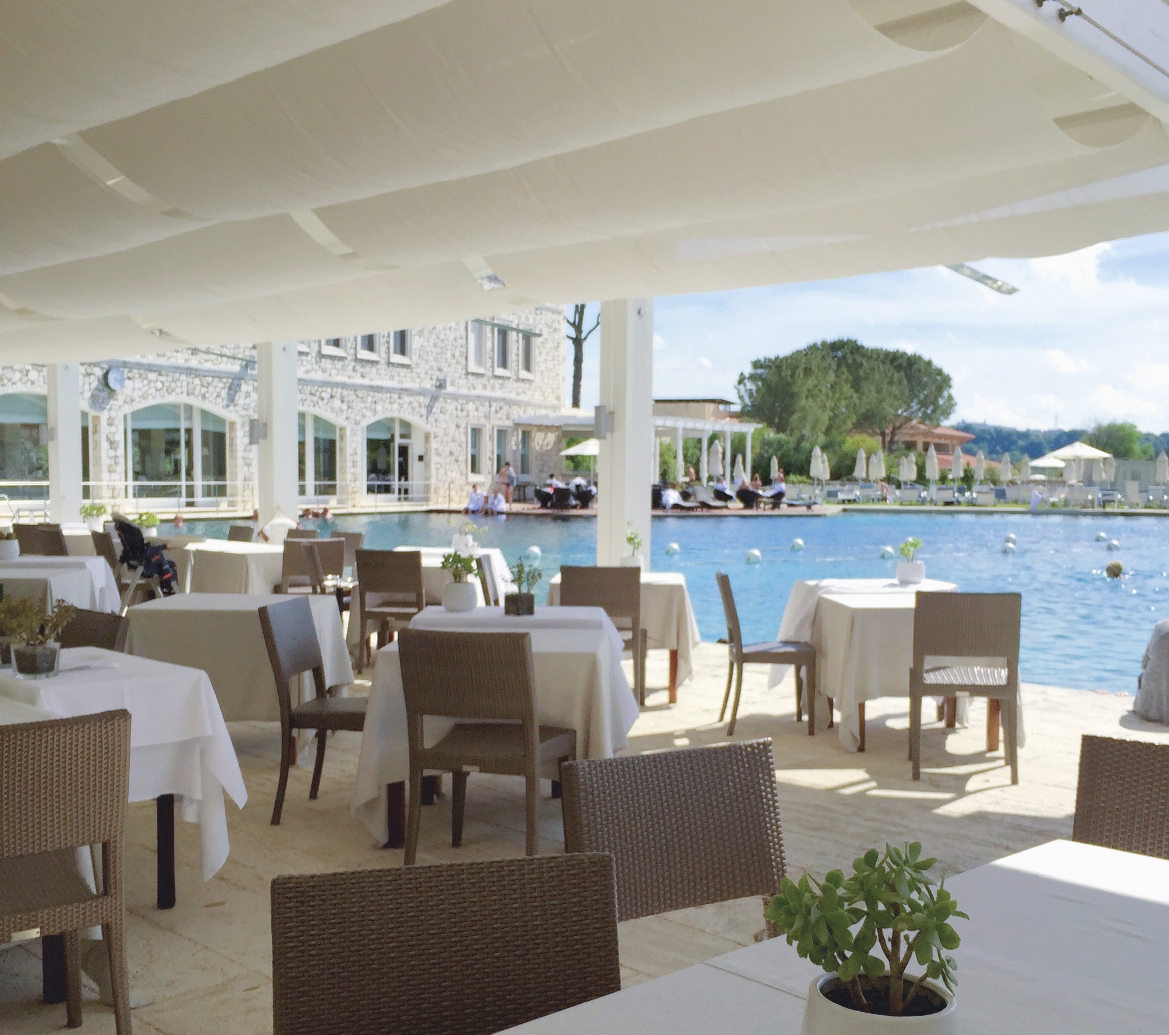 Outdoor seating available during breakfast and lunch. If you don't mind the smell, the view is quite nice. 