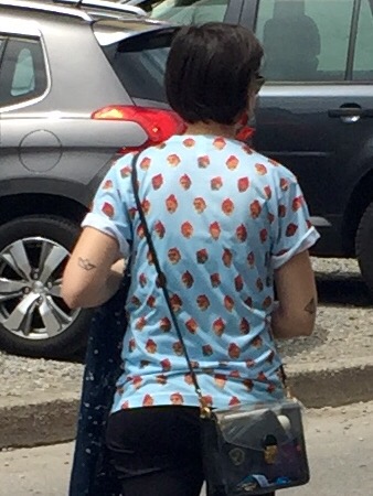 I wonder if she is here on accident... JK she is wearing a shirt covered in little steves!