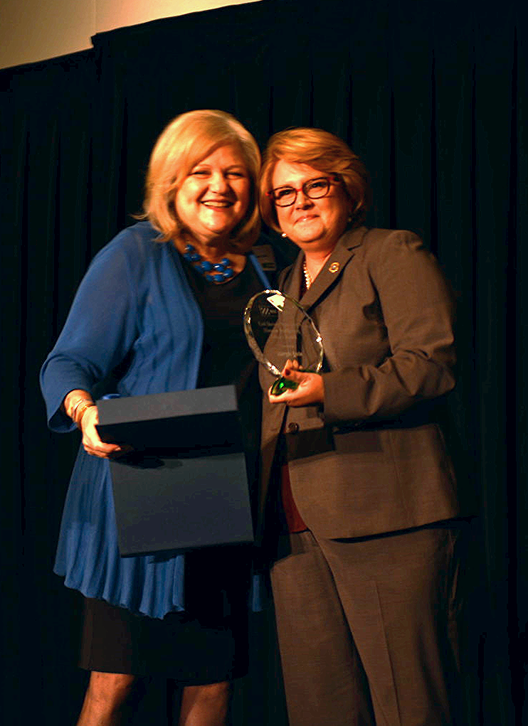 Derri Smith with first Human Trafficking Impact Award recipient, Margie Quin of TBI.