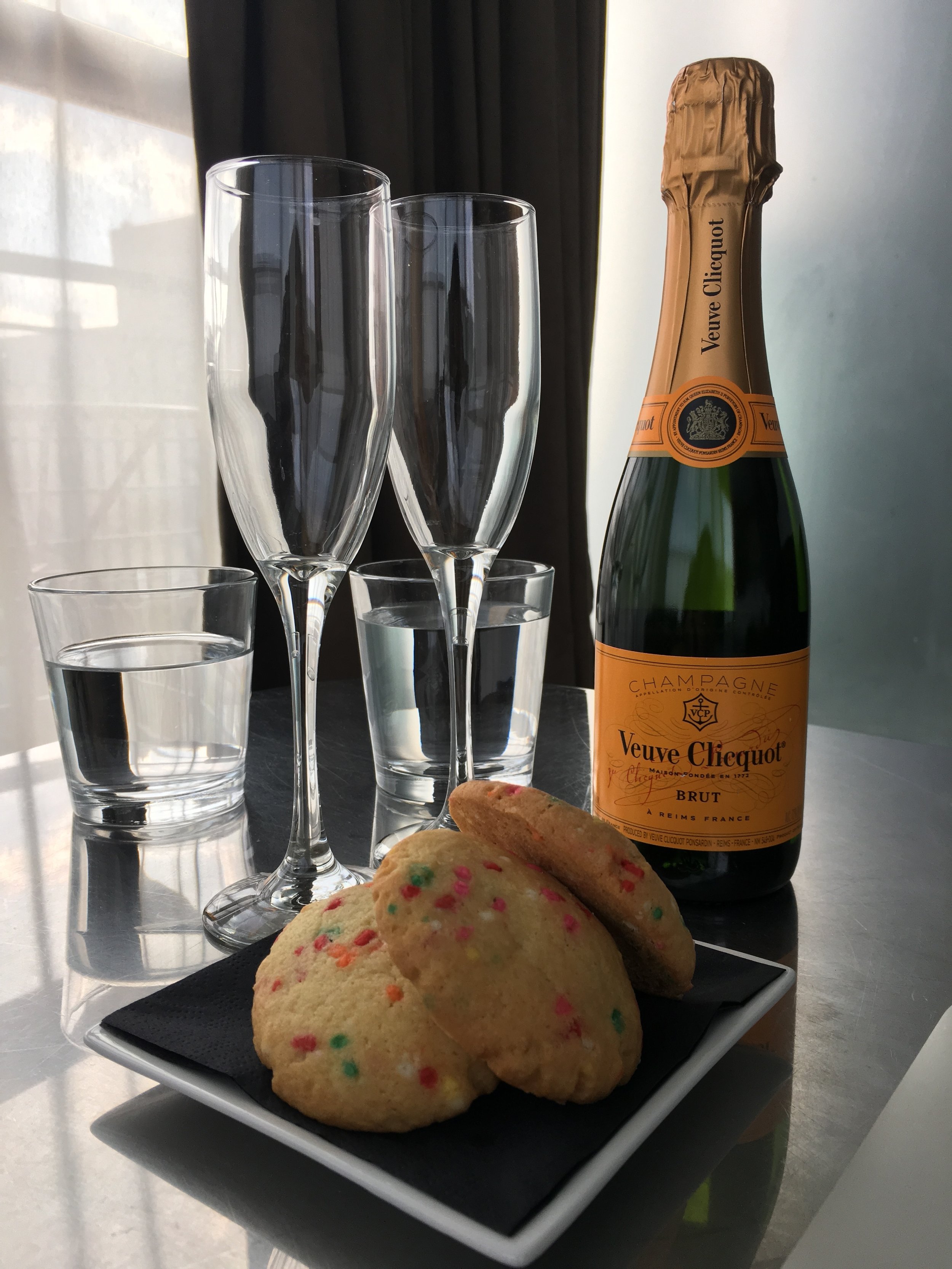 champage and cookies on table - photography experience
