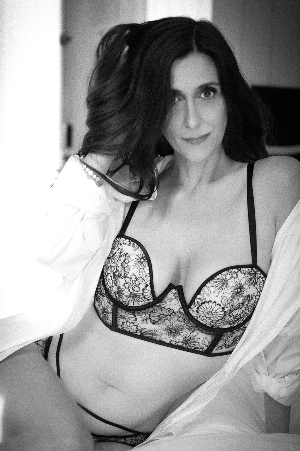woman wearing floral bra - why you need boudoir more than ever
