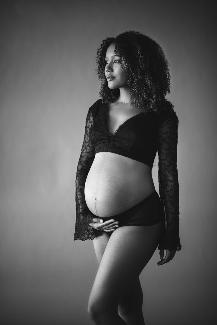 pregnant woman in black top - best mother's day gift