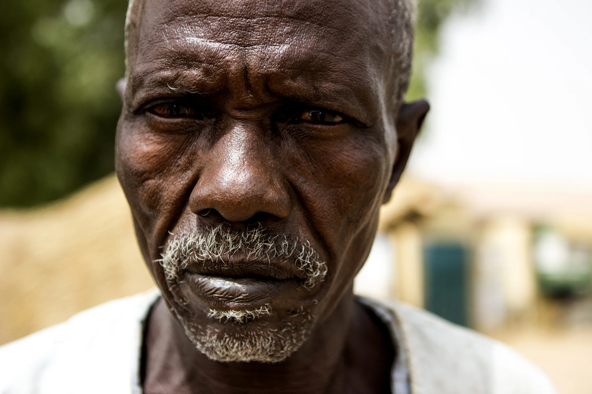 A retired Nigerian military soldier is seen in Yola, Nigeria, on March 4, 2015, at an informal camp for people displaced by Boko Haram violence. He says he's disappointed in the government's response to the insurgents. "They're habitual criminals," he said. "Why are we not fighting them as such?