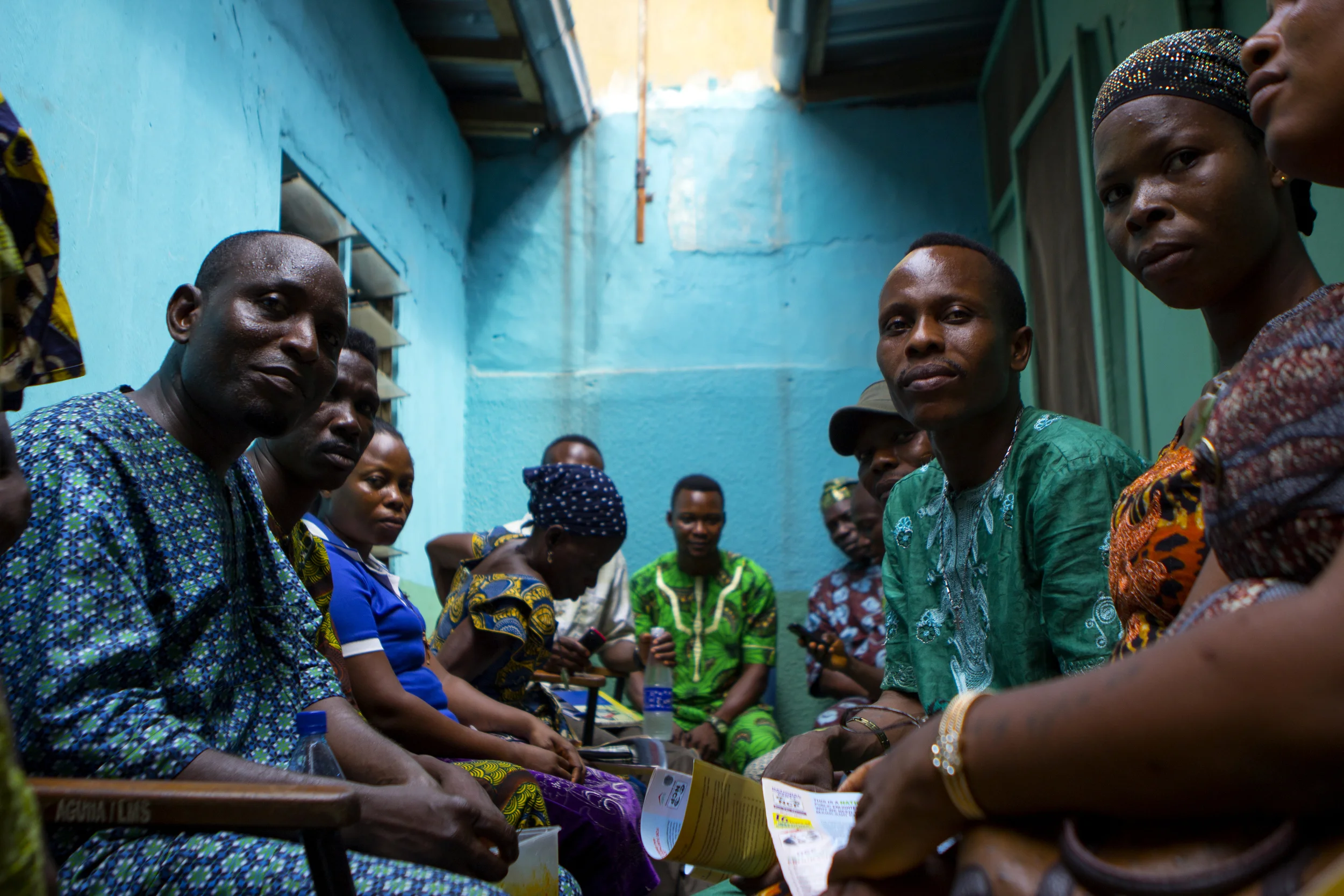Lagos, Nigeria. Feb. 25, 2015. Agbodemu Ishola, a local politician and activist, meets with members of the Makoko neighborhood to discuss community issues and the upcoming election. 
