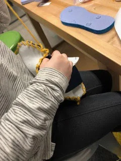 Sewing a show together.