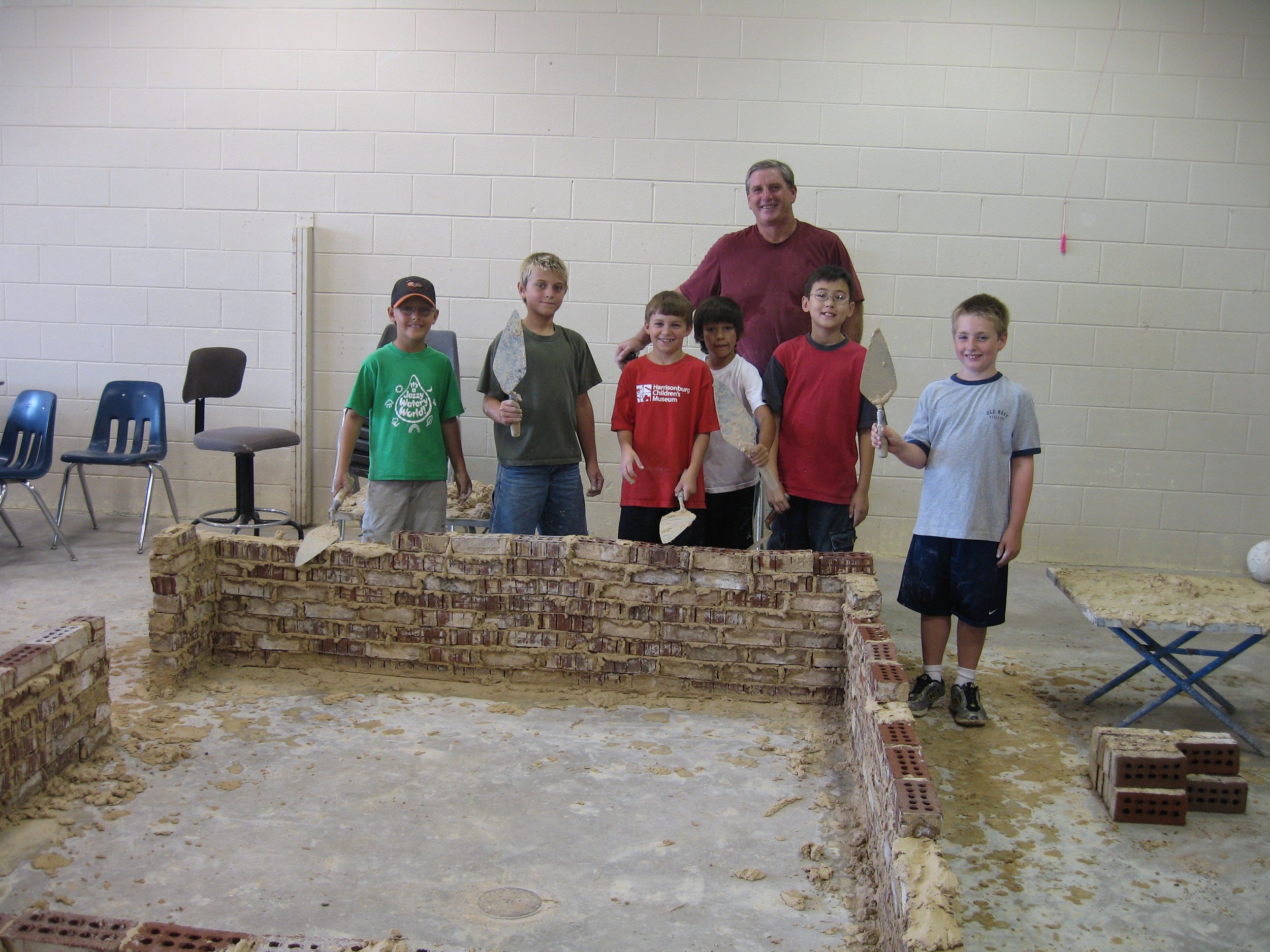  We’ve had a long partnership with Massanutten Technical Center. Instructor Dave Suba taught summer camp participants the art of bricklaying.  
