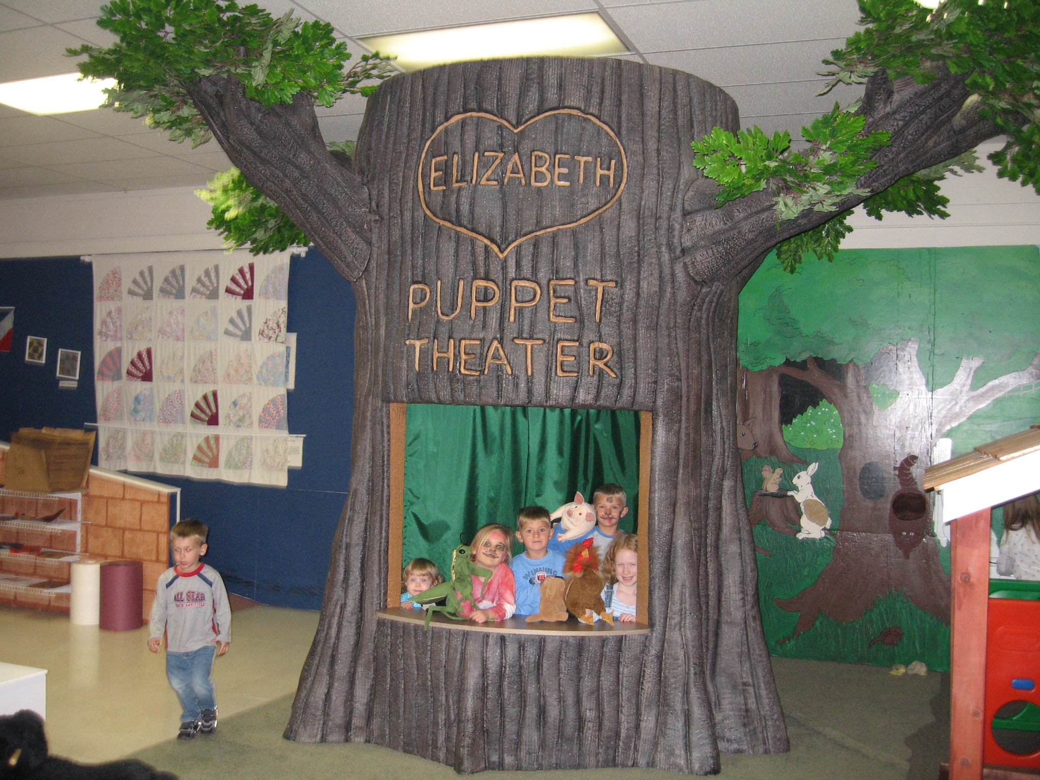  The Museum’s first professionally fabricated exhibit was the Puppet Theater. This was made possible by the Kyle Family as a memorial for their beloved Elizabeth. It is still enjoyed by families at the current location.  