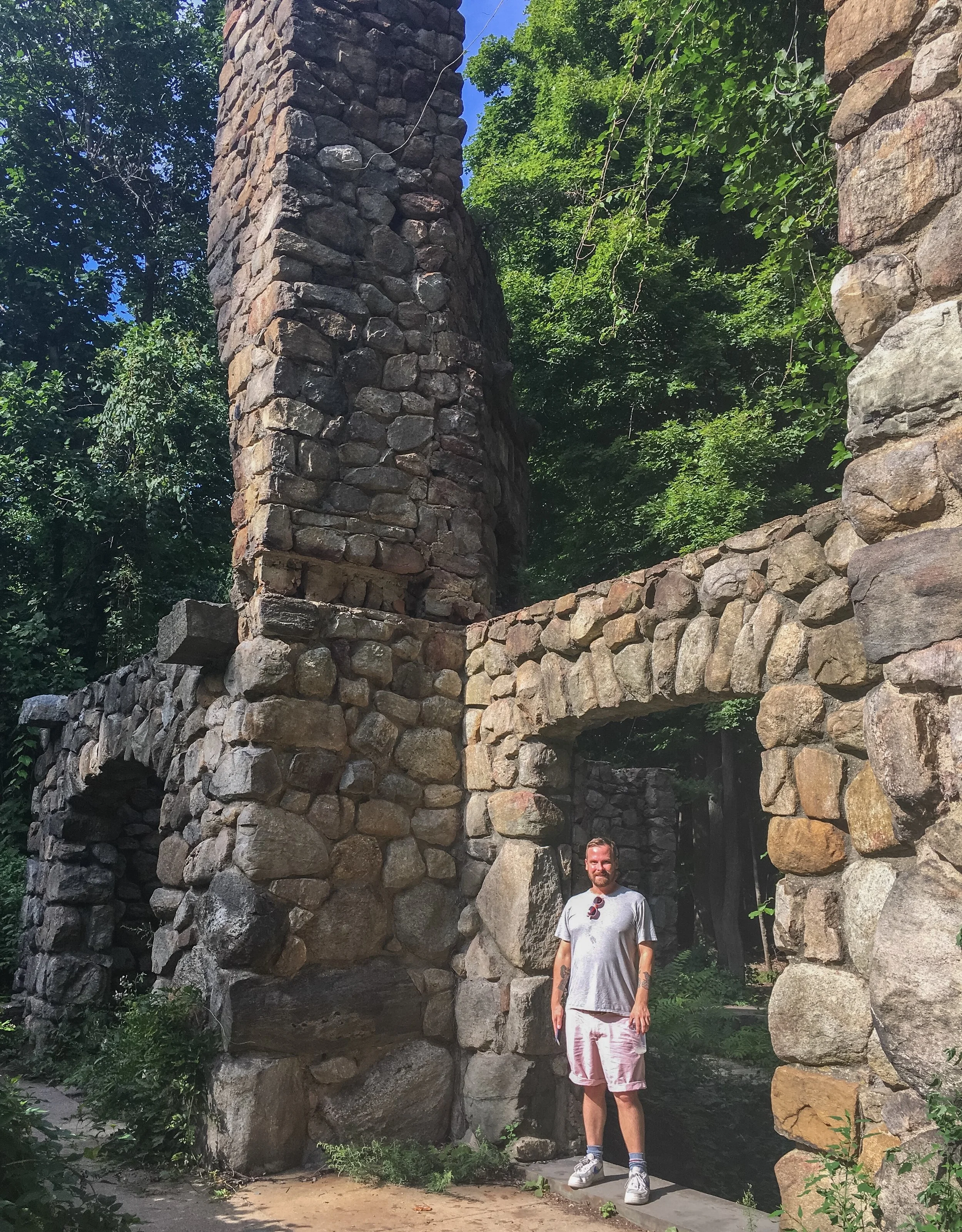 Me - very sweaty - standing in the house's main entry. 