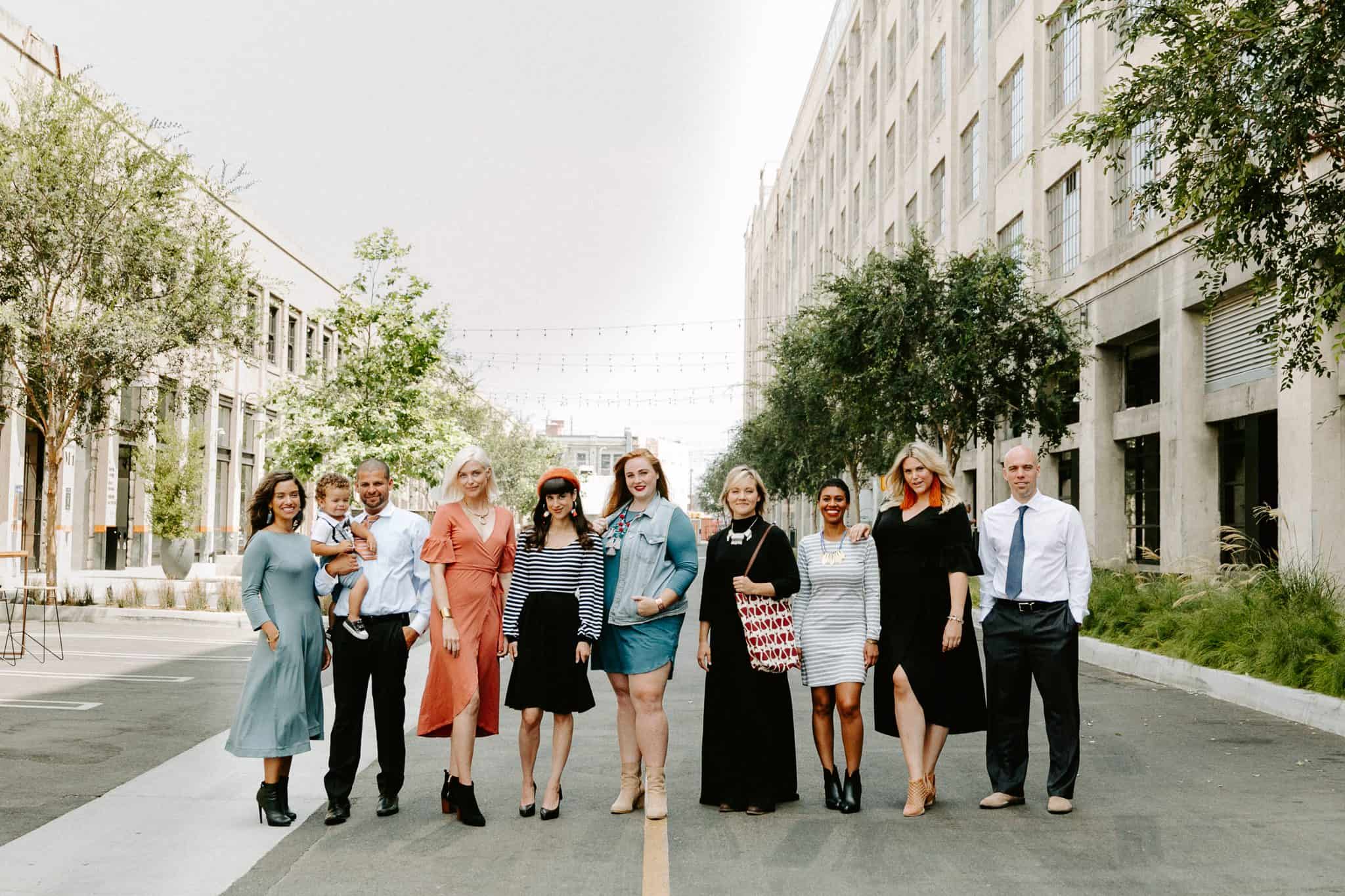 Photo of people wearing dresses and ties.