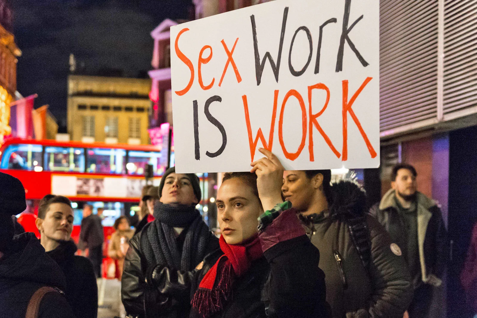 PHOTO: Protester holds a placard supporting sex workers in London. Barcroft Media via Getty Images