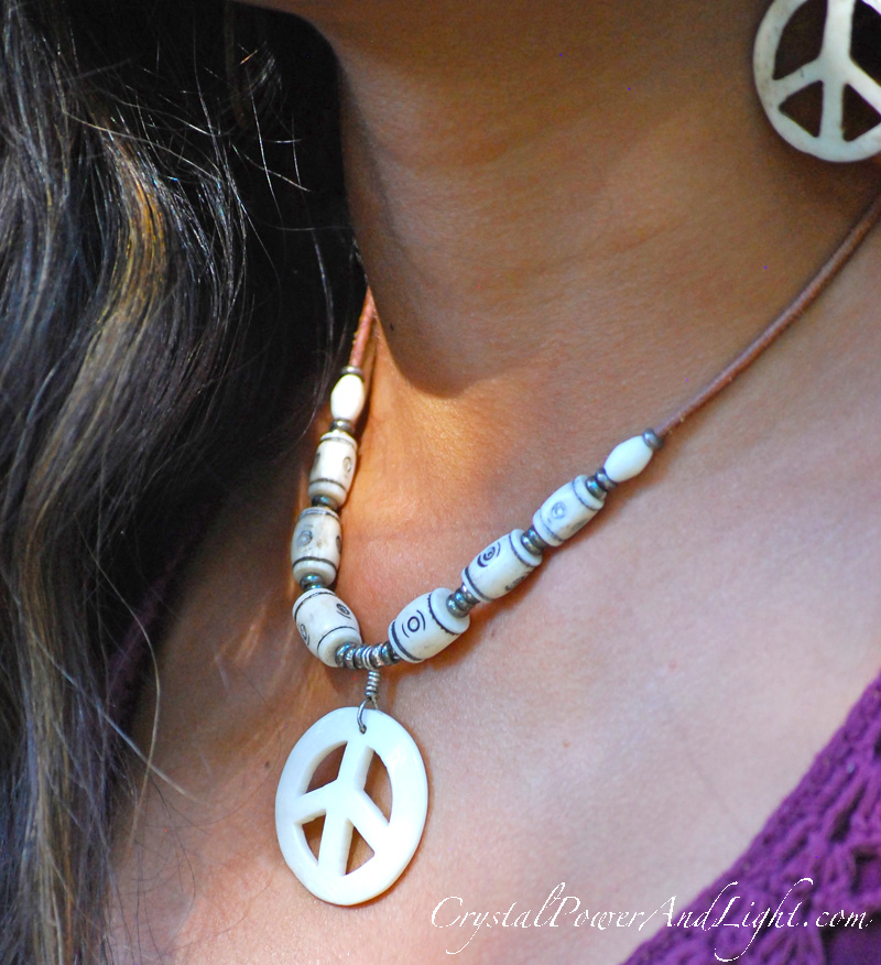 crystal-power-and-light-peace-sign-earrings-and-necklace-s-closeup-800x876.jpg