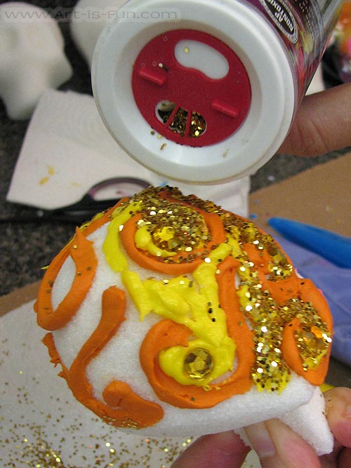 Adding Glitter to Sugar Skulls