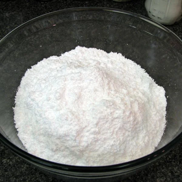 Making Sugar Skulls with the help of Powdered Sugar