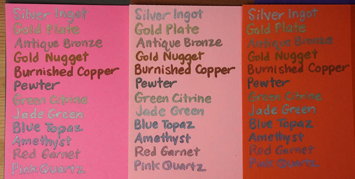 Spectrum Noir Metallic Markers on fluorescent pink, pale pink and orange papers