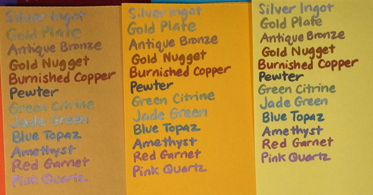 Spectrum Noir Metallic Markers on tan, yellow-orange and yellow papers
