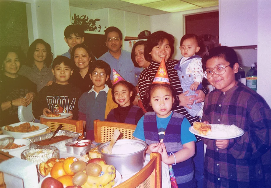 Another birthday party, when someone thought it was a great idea for the whole gang to pose with the food .