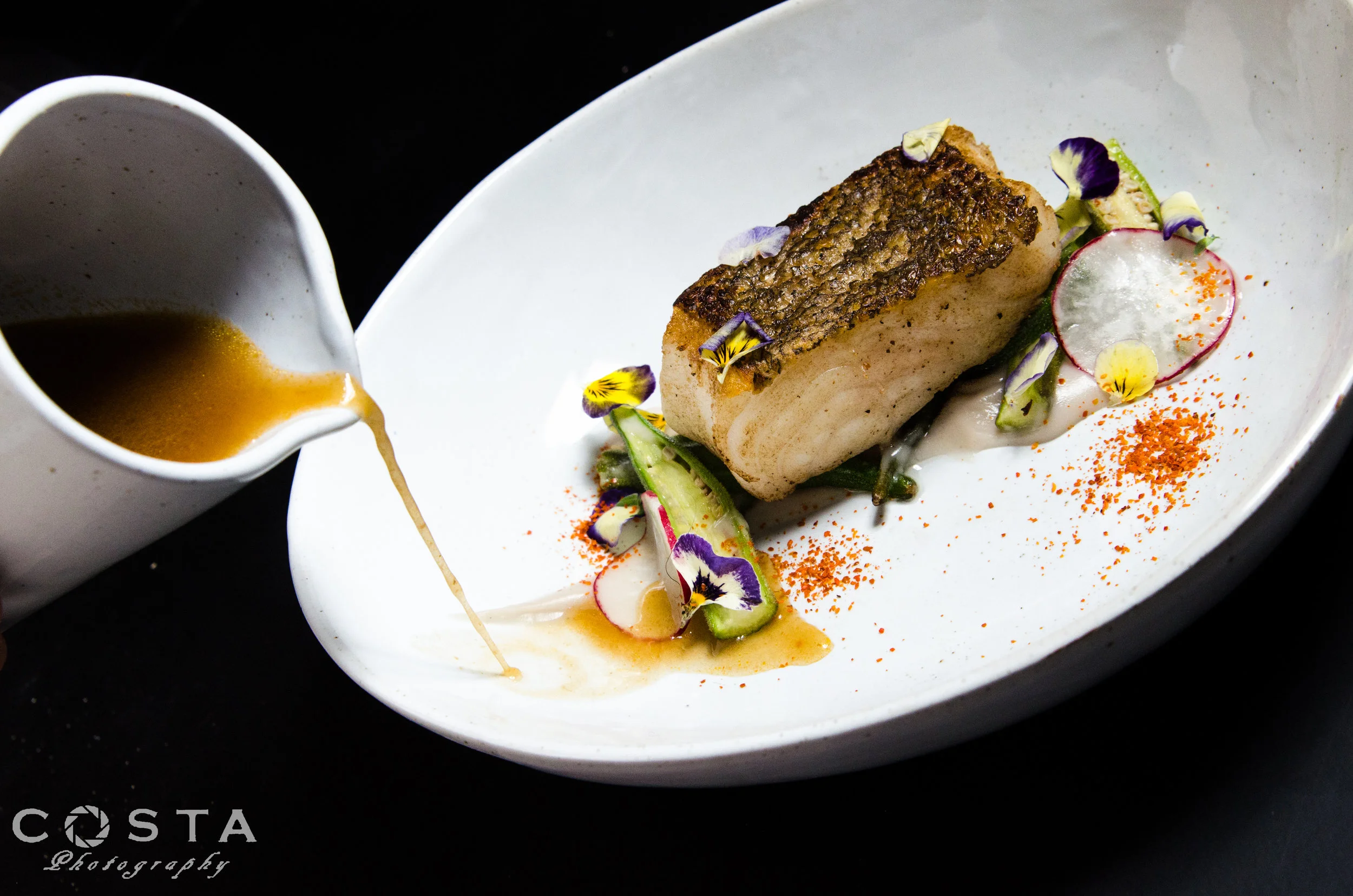 Our take on sinigang: pan-seared rockfish, okra, radish, tamarind veloute