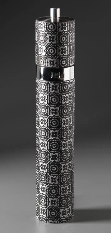 Embossed metal on wood peppermill.jpeg