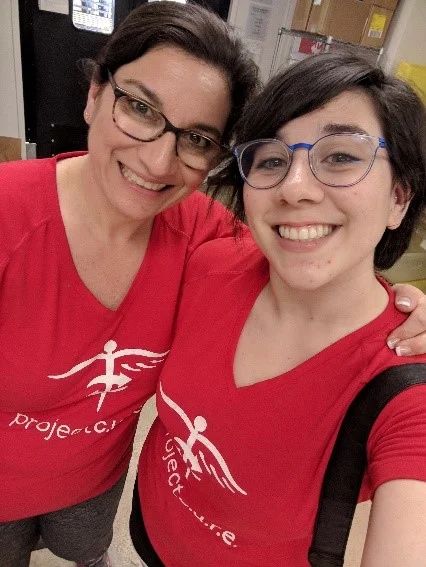 Alyssa with her mother in the Houston warehouse