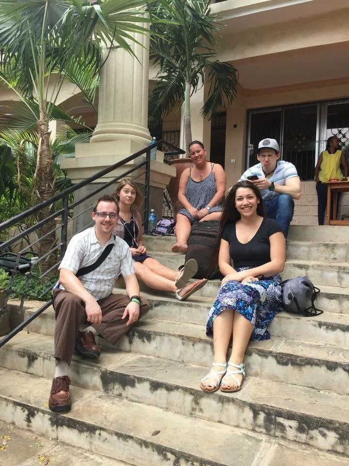Relaxing on the steps of Crossroads Fellowship after the morning service.