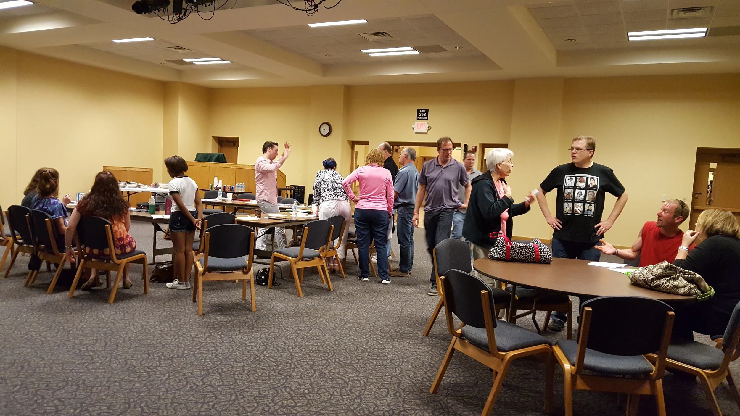 The team divides into groups to prepare for a special day with the children in our schools.