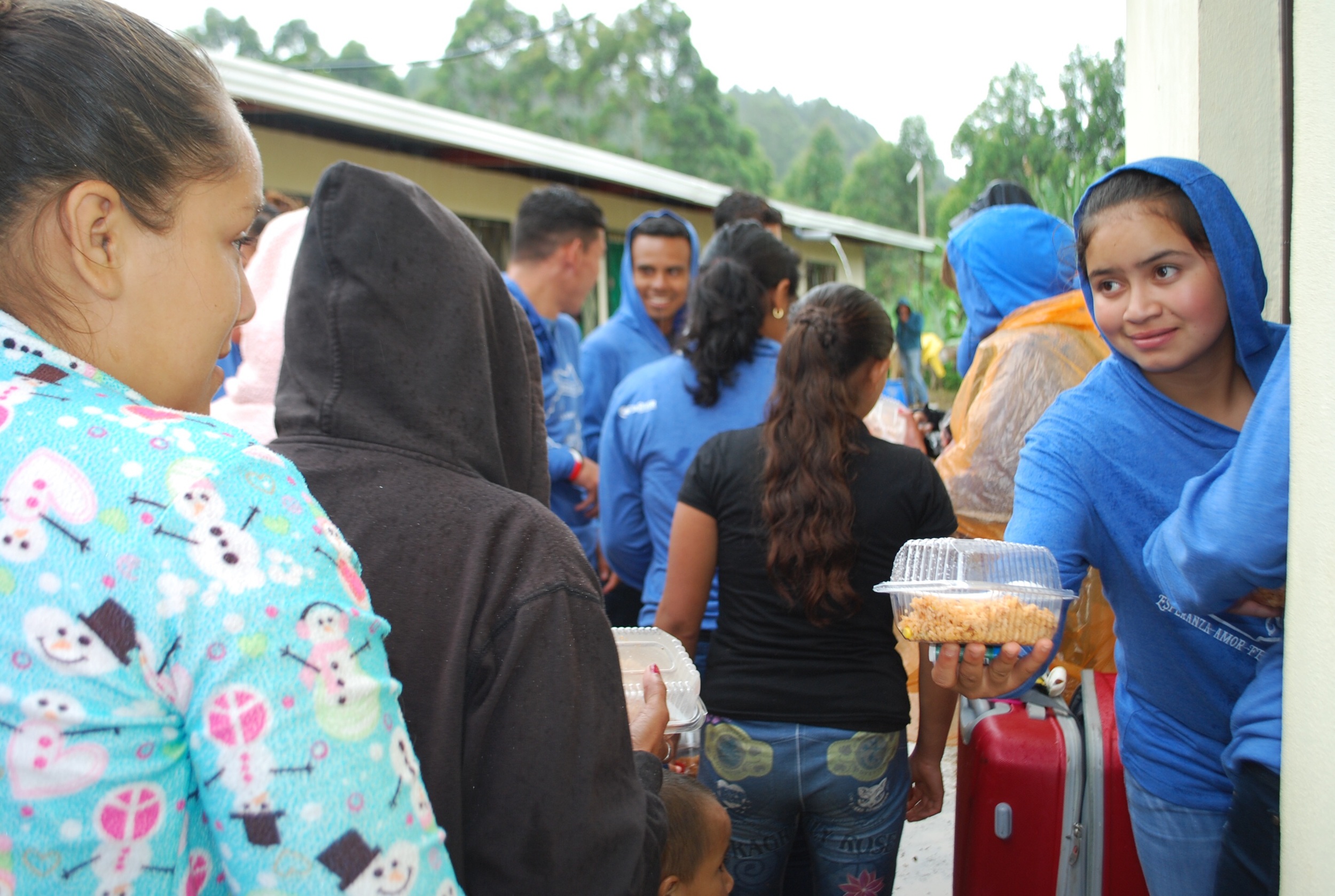 After the service each person received lunch, a Coke and a flashlight with the clinic logo in it.